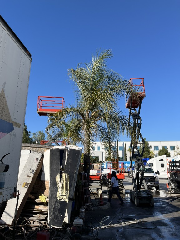 On-site fleet body work using a scissor lift in San Diego