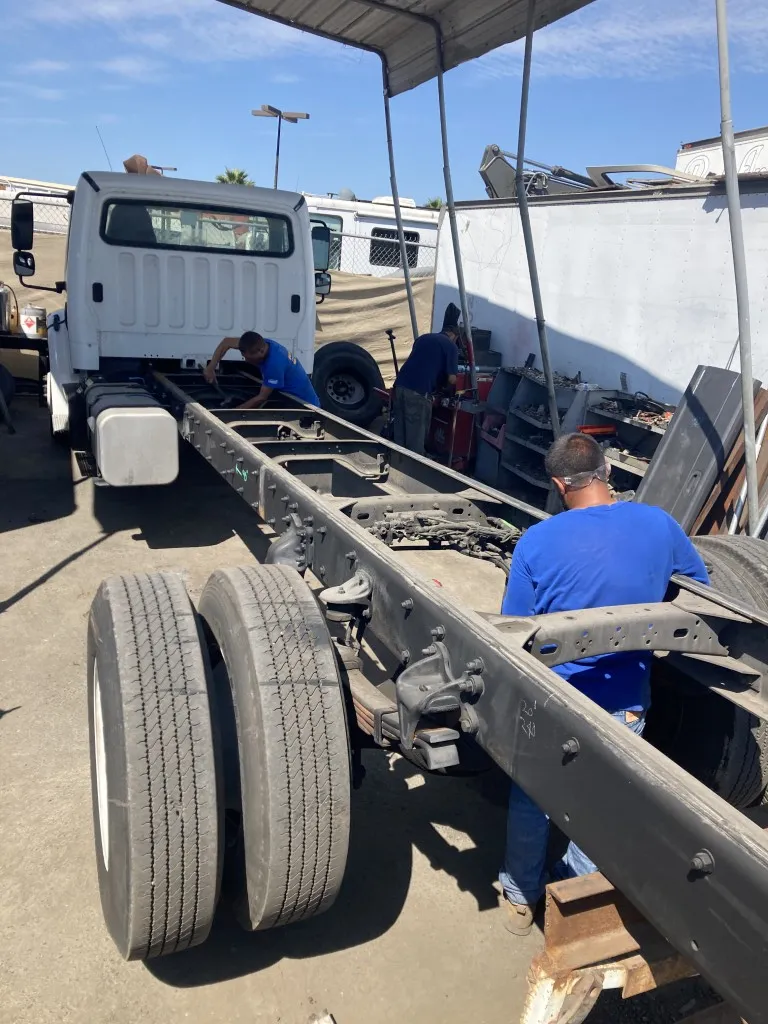 Chassis rail and crossmember structural repair on a commercial truck in San Diego